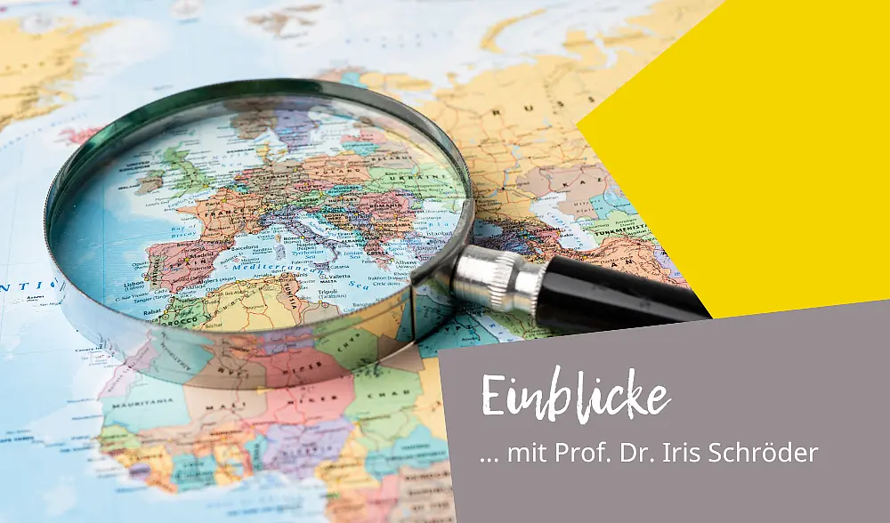 Lupe auf einer Weltkarte