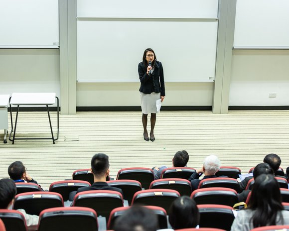 Woman giving lecture