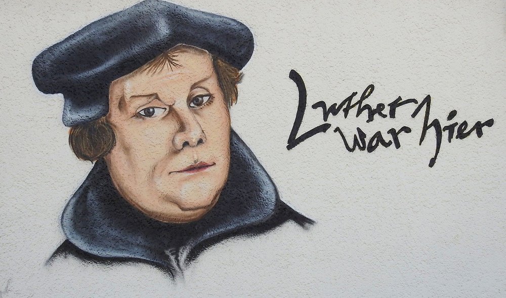 Graffiti mit Luther auf einer Fassade