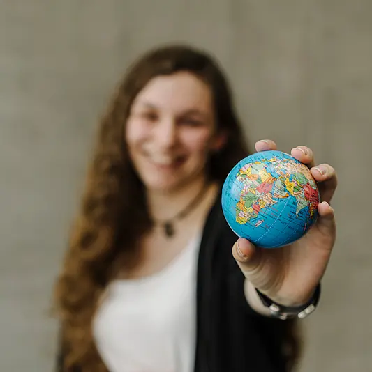 Student with globe
