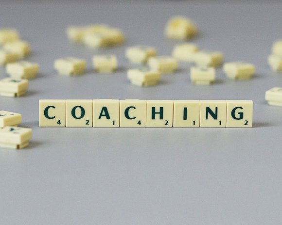 The word coaching with scrabble stones
