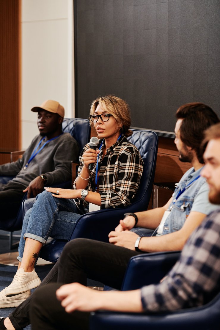 young people talking in a seminar setting