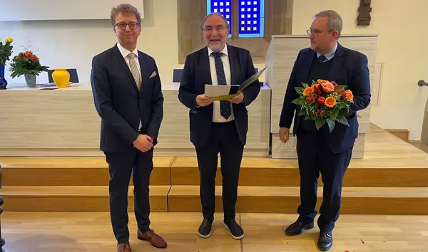 Dr. Torsten Müller mit Prof. Seiler und Prof. Zaborowski bei der Übergabe des Erich-Kleineidam-Preises