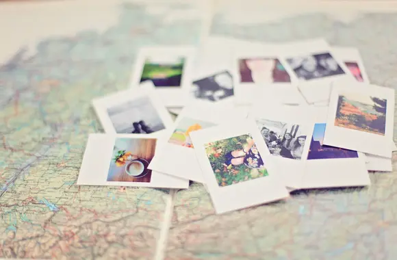 Polaroids on a world map