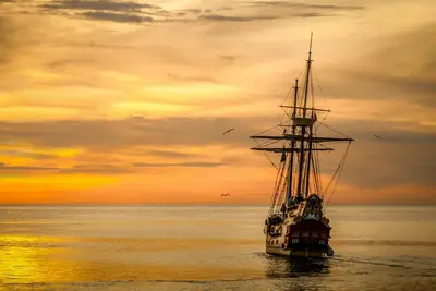 sail boot at sunset