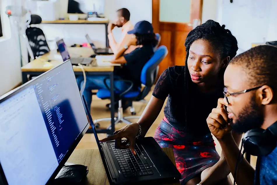 People infront of Computer