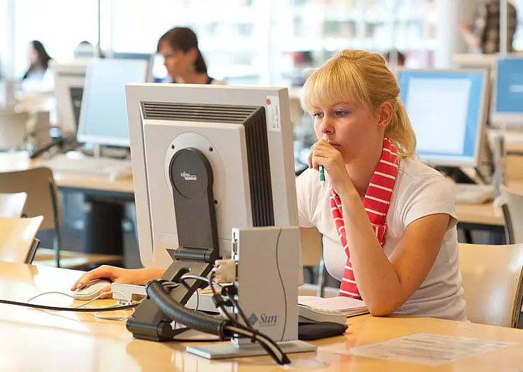 female studtent at the university library