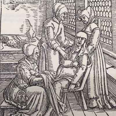 Early modern depiction of a midwife at work