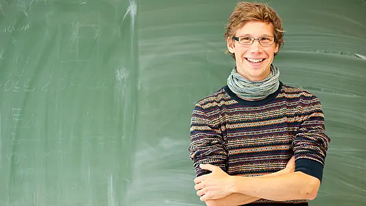 Student vor einer Tafel