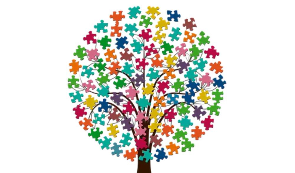 Symbolbild Inklusion (Baum mit bunten Puzzleteilen, die die Blätter darstellen)