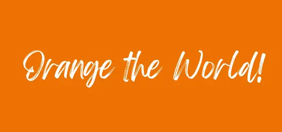 "Orange the World" lettering on an orange background